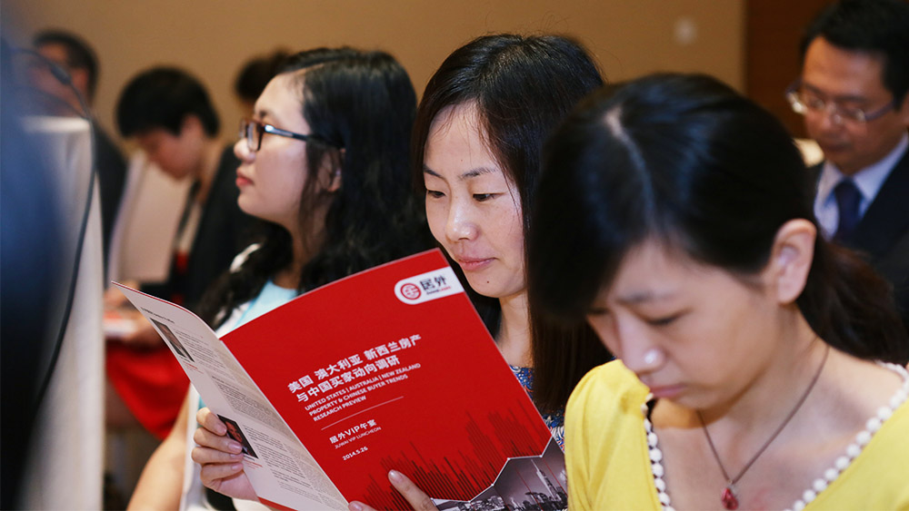 Chinese buyers looking at Juwai brochure